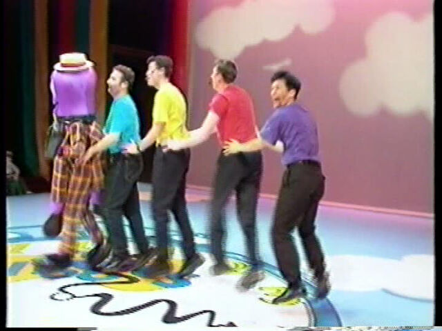 File:Let'sHaveaDanceWithHenry-WigglesCongaLine.jpg