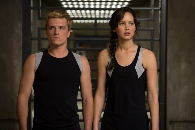 File:Peeta-katniss-catching-fire training.jpg