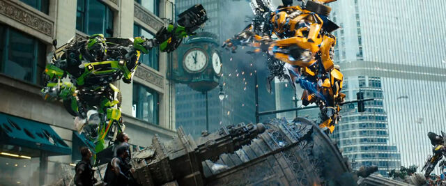 File:Dotm-ratchet&bumblebee-film-pillar.jpg