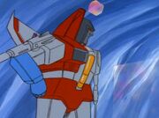 Fire in the Sky Megatron Hits Starscream with a Cube.jpg