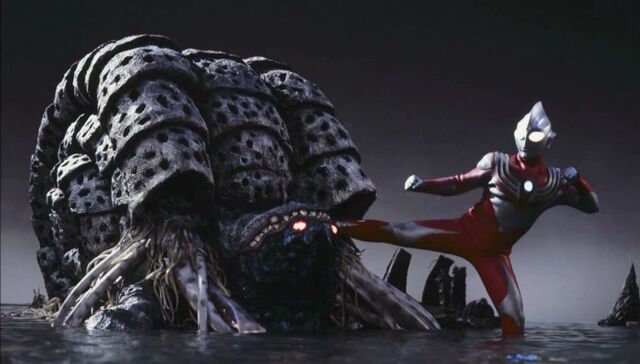 File:Tiga Power Type vs Gathanozoa.jpg