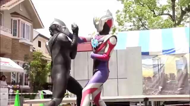 File:Tiga Dark vs. Orb.jpeg