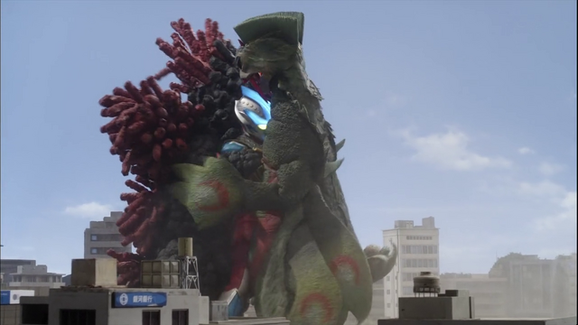 File:Ginga is caught in a combat hug between Velokron and Doragory.png
