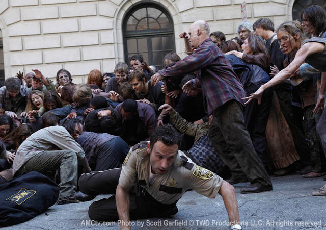 File:Rick escapes from zombies.jpg