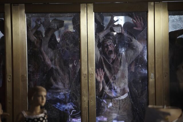 File:Zombies attack door.jpg