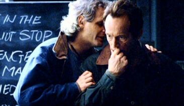 Chris Carter whispers to Lance Henriksen